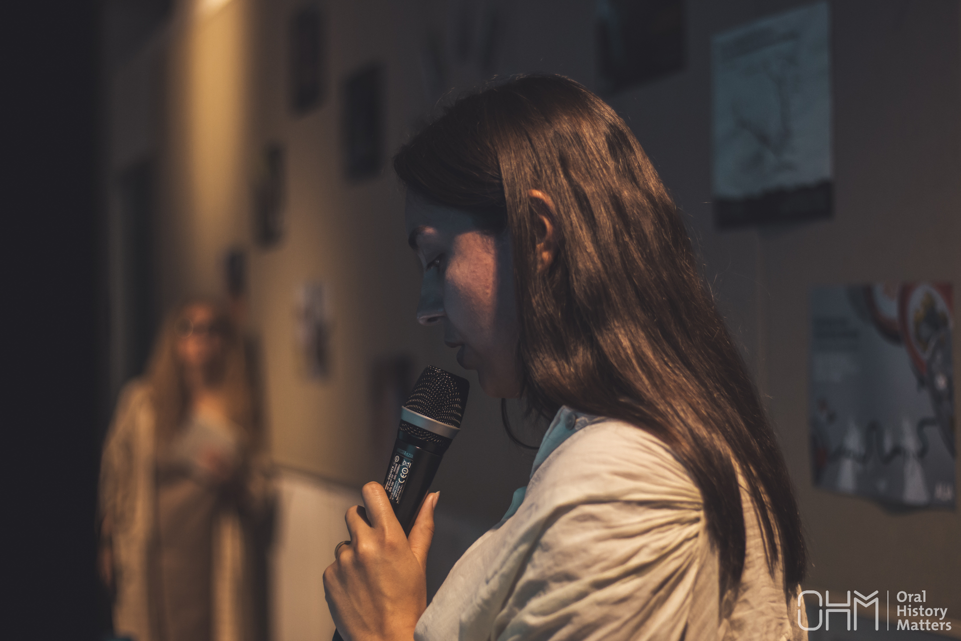 Gayane speaking with a microphone
